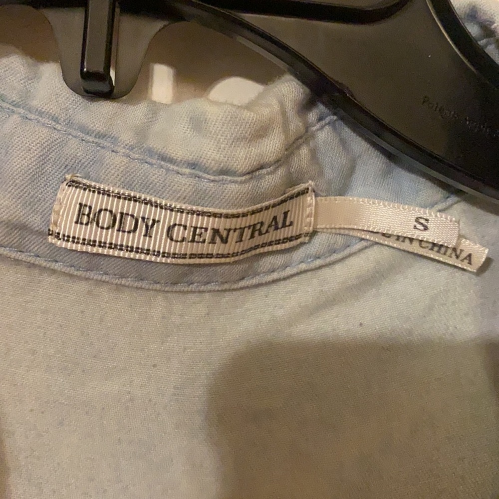 A button up. See through back. - Picture 2 of 4